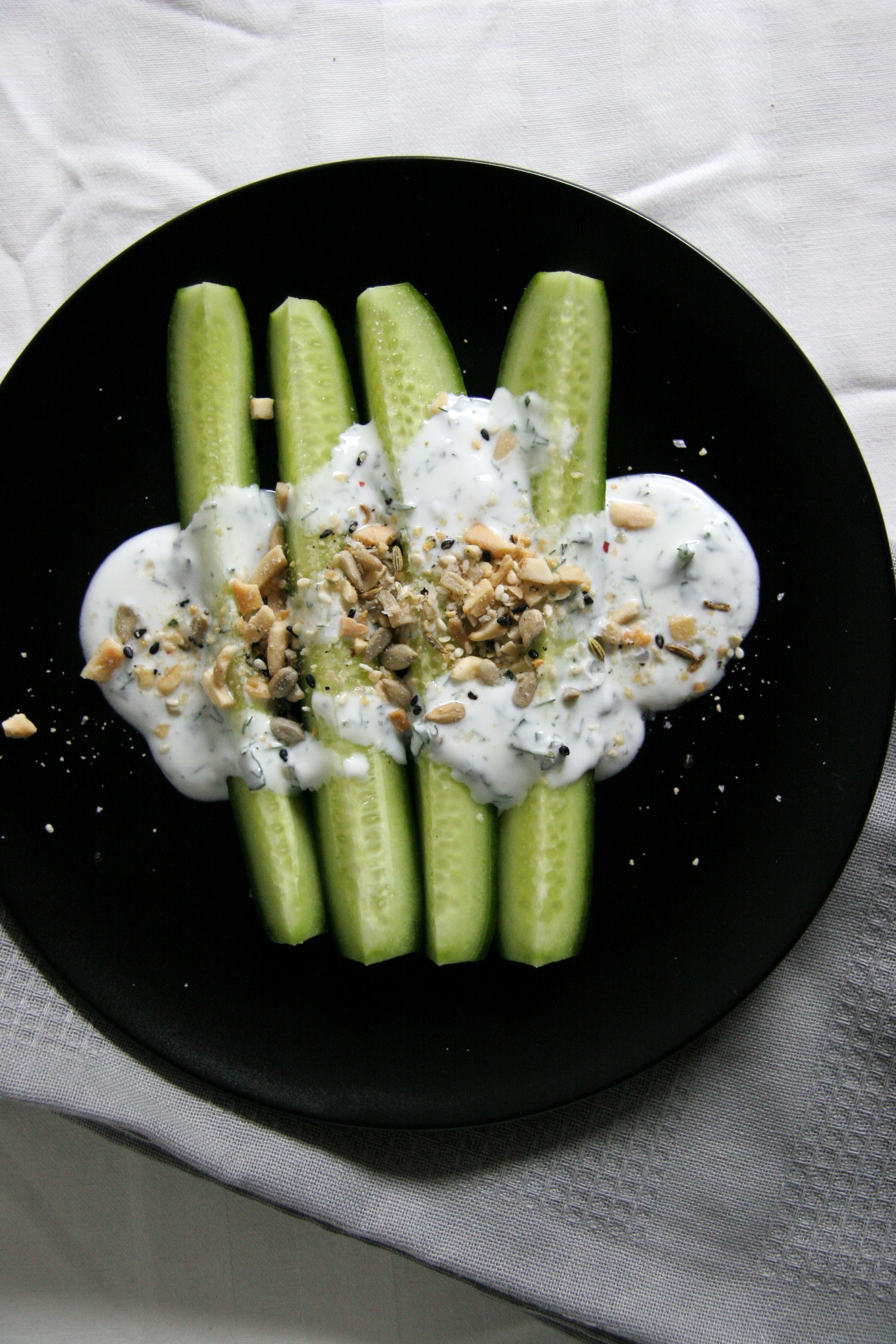 Healthy Cucumber Dukkah Snack with herbed yogurt.