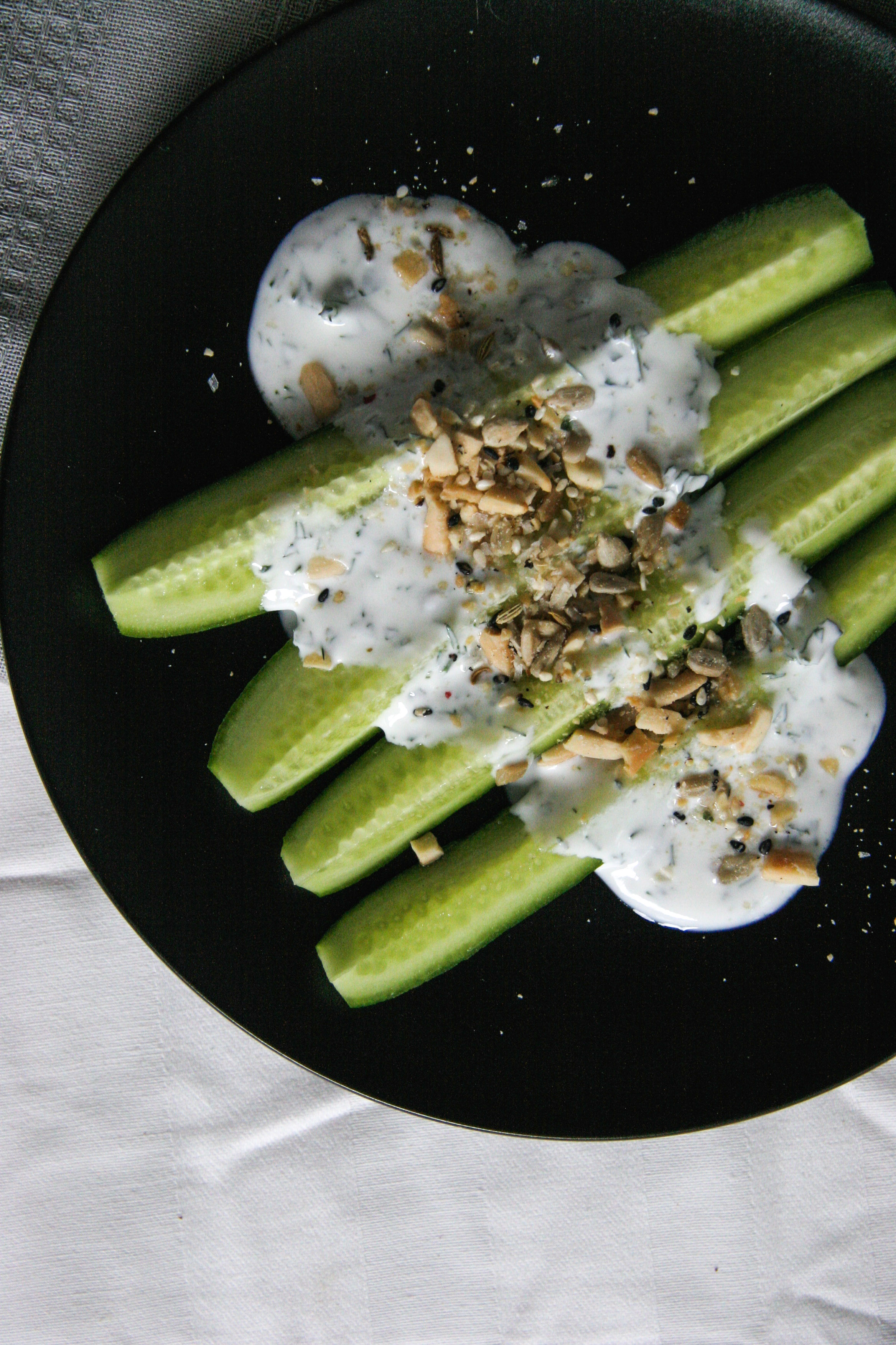 Healthy Cucumber Dukkah Snack with herbed yogurt.