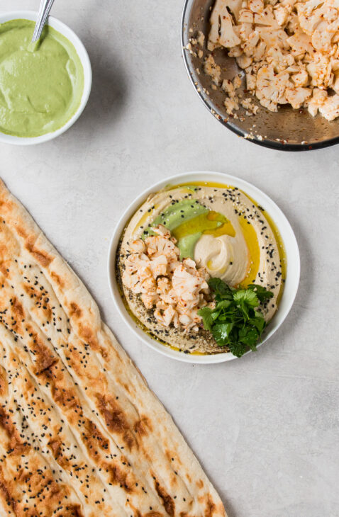 Aleppo Cauliflower Salad and Green Tahini over Hummus