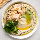 Aleppo Cauliflower Salad and Green Tahini over Hummus