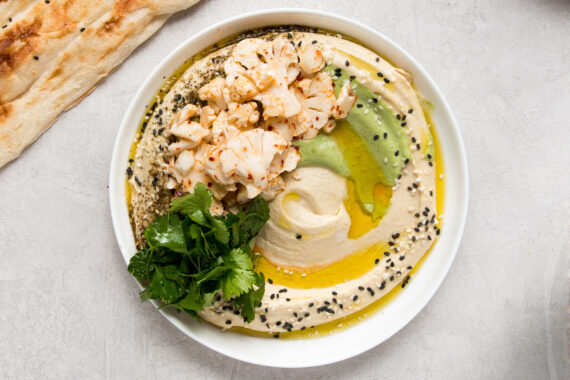 Aleppo Cauliflower Salad and Green Tahini over Hummus