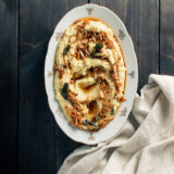 White Sweet Potato Mash with Brown Butter Almonds and Pine Nuts