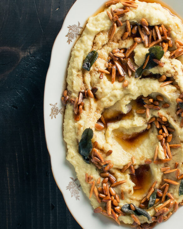 White Sweet Potato Mash with Brown Butter Almonds and Pine Nuts