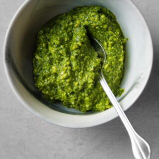 This is my Kale & Basil Pesto which I can't live without (RECIPE BELOW). I usually keep a bowl of this in the fridge since it's a life saver when I'm looking to add something flavorful to my meals and snacks. Just this week I used some for my toast with tomatoes (in my reels), a meatball dish for my kids, slathered on a quick seared chicken breast, and in my scrambled eggs! Save this post!

To keep it vibrant and fresh, I make sure to cover it well with plastic wrap, pressing as much of the air out as possible and making sure that the plastic wrap is touching all the way around the bowl so no air can get in. I do this with guacamole too. (Little secret, this vibrant green pesto in the reel was made 5 days before shooting). 

1/2 bunch lacinato kale, stems removed & roughly chopped
10 basil leaves
3/4 cup grapeseed oil or canola
1 clove garlic
1 cup grated parmesan
1/2 cup pine nuts
2-3 tbsp lemon juice
1 tsp white miso (optional)
Kosher salt

Blanch the kale in a pot of heavily salted boiling water, until slightly wilted, 30 seconds. Immediately drain and rinse under cool water. Squeeze as much water out of it as possible. 

Place kale and all the remaining ingredients in a blender or food processor. Blend on low.  You can leave it as a rough texture like I do or blend longer until smooth. 

Keep very well covered in the fridge for up to a week. 

#recipe #pesto #howto #fridgestaple #easyrecipe #kale #recipes #healthyrecipes #simple