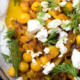 Recipe: Sautéed Turmeric Chickpeas over Labne with Feta
Quickly sautéed chickpeas spiced with turmeric and cumin seeds top a creamy labne and get a sprinkle of salty feta cheese for this super easy lunch, side dish or even dinner! Recipe below or go to the link in my profile for a printable!

INGREDIENTS
5 tbsp olive oil, divided
1 medium onion, thinly sliced
1 tsp turmeric
1/4 tsp cumin seeds , or ground cumin
1 can chickpeas, drained
kosher salt
black pepper
1/2 cup labne, or thick greek yogurt
1/3 cup crumbled feta cheese
fresh dill
METHOD
Heat 3 tbsp of olive oil in a large skillet over med-high heat.
Add onions & sauté, stirring occasionally, until lightly browned & softened, 6-7 minutes.
Add turmeric & cumin seeds & stir until fragrant, about 30 seconds.
Add chickpeas & the remaining 2 tbsp of olive oil. Season w/ kosher salt & black pepper.
Sauté until chickpeas are warmed through & sizzling, 2-3 minutes.
Plate the labne, top w/ chickpeas, crumble feta cheese over top, & garnish w/ torn dill.

#chickpeas #recipe #recipereels #recipevideo #video #reel #howto #dinner #whatscooking #huffposttaste #f52grams #nytcooking #eatvoraciously #foodbeastfoodfight #vegetarian #weeknightdinner #weeknightmeals ##recipeoftheday #recipeshare #allrecipes #vegetarian #vegetarianrecipes
