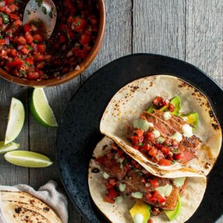 Taco Tuesday! Topping my Steak Tacos with Urfa Pico de Gallo today. I use this recipe constantly during peak tomato season. The smoky yet sweet Urfa pepper flake adds an incredible flavor. Sear up some steak, cut up some avocado, top it with this pico de gallo and drizzle some nice herby crema on top! You can also just eat this with tortilla chips too! Here is the recipe for the Urfa Pico de Gallo:

Ingredients
6 Roma (or any peak season variety) tomatoes, finely diced
2 cloves garlic, grated on a microplane
1⁄8 red onion, finely diced
2 tbsp finely chopped fresh cilantro
2 tbsp fresh lime juice
2 tsp Urfa biber
Kosher salt

Instructions
Combine all ingredients in a bowl. Taste and adjust seasoning with lime and salt.

#picodegallo #recipes #recipeoftheday #tacotuesday #tacos #steak #peakseason #tomatoseason #tomatoes #summer #summergrilling #summergrillingseason #tomatotuesday