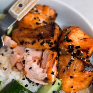 Had to repost this one bc we have it on repeat! Harissa Hot Honey Salmon Bowl! Recipe below! Incredibly simple and quick to make with tons of flavor. A little trick to getting super juicy salmon, that doesn’t eek out white stuff (albumin), is to brine it in salt water. A simple thing with salmon-life changing results. 

How easy? Soak the salmon in salt water. Make the sauce. Toss the salmon in the sauce and broil for 5 minutes. DONE. Seriously. It’s that simple. I serve it on rice with cucumbers, a squeeze of lime and furikake but it’s perfect on its own or on top of some salad!

3 cups COLD water
3 tbsp kosher salt
3/4lb+ skinless salmon filet (sushi grade)

3 tbsp harissa
2 tbsp honey
1 tbsp soy sauce
1 tbsp sesame oil
1 tsp kosher salt

Cooked Rice
Cucumbers
Lime
Furikake

Place oven rack in the top third of the oven and heat broiler to high.

Whisk the kosher salt into the cold water until dissolved. Add the salmon and soak for 10 minutes.

To make the sauce, whisk together the harissa, honey, soy, sesame oil, and kosher salt.

Remove the salmon from the brine, pat it dry, cut into 1 ½ “ pieces and toss in the sauce. Optional: let marinate for 20 minutes at room temp.

Place the salmon on a tin foiled lined sheet tray greased with cooking spray.

Broil 5 minutes… no longer.

Serve on top of cooked rice with cucumbers, lime and furikake!

#salmon #recipes #recipereels #easydinner #weeknightdinner #familyrecipes #hothoney #bowls